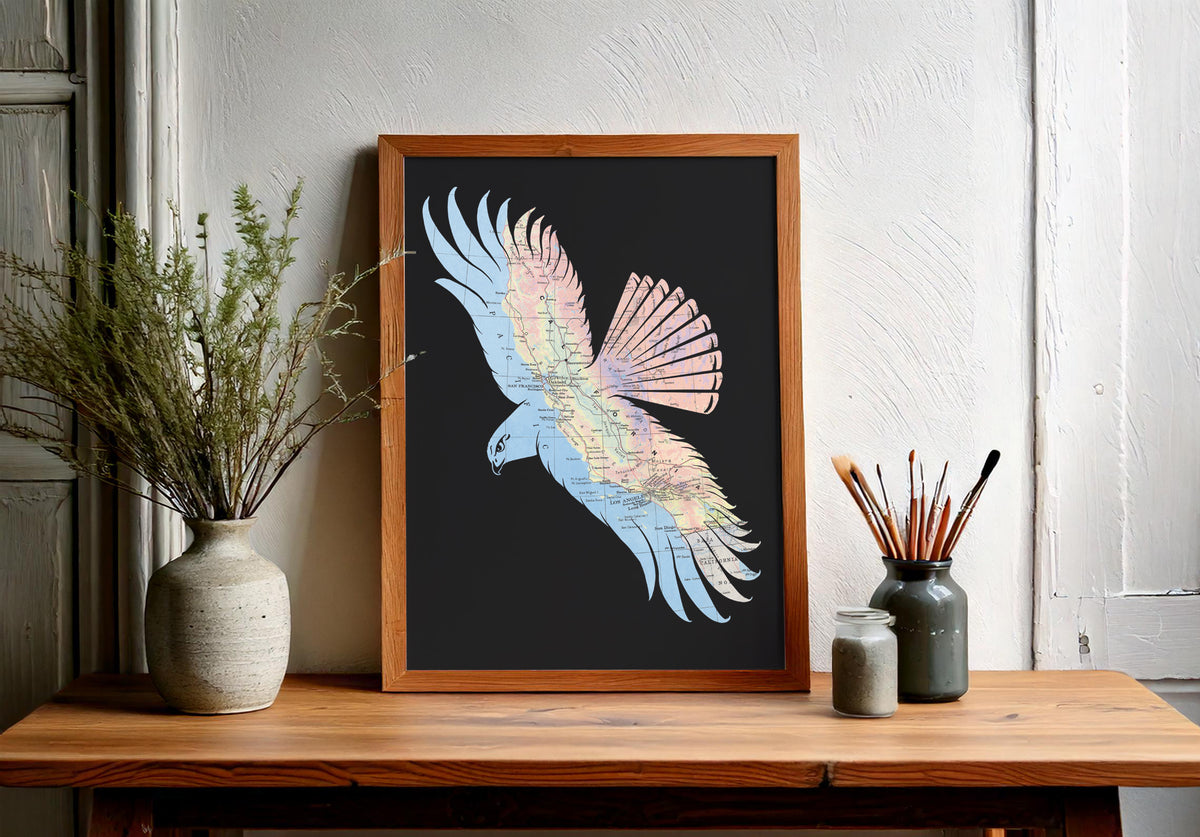 Map art featuring a red tailed hawk made from a California map